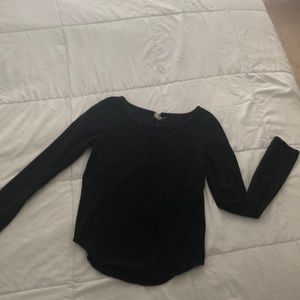 Black woman’s shirt.